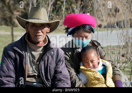 Old farmer with wife and daughter Emerald Lake Yunnan China Stock Photo