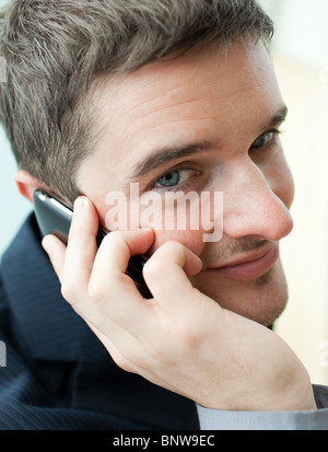 Portrait of a handsome businessman on phone Stock Photo