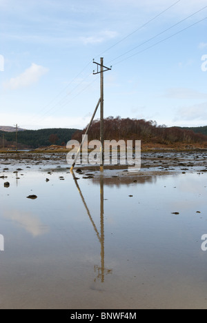 Overhead electricity power lines, Kentra Bay, Scotland Stock Photo