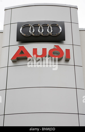 A Porsche and Audi car dealership.  Stock Photo