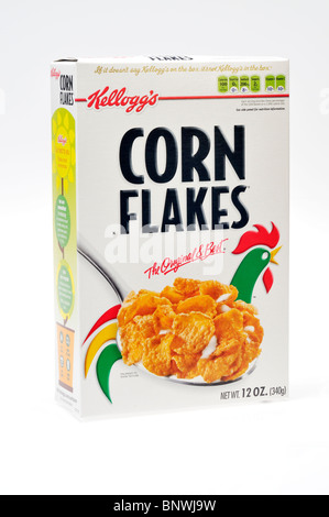 An unopened box of Kellogg's corn flakes breakfast cereal on white background, cut out. Stock Photo