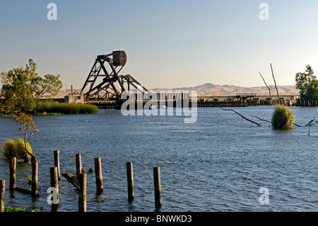 Trestle Draw Bridge across Middle River in Central Valley Delta Region, California. Summer afternoon. Stock Photo