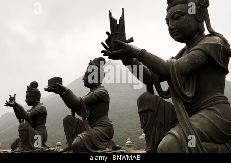 Beautiful Buddha sculptures surrounding the big Buddha by the Po Lin Monastery. Stock Photo