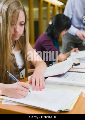 College students working in library Stock Photo