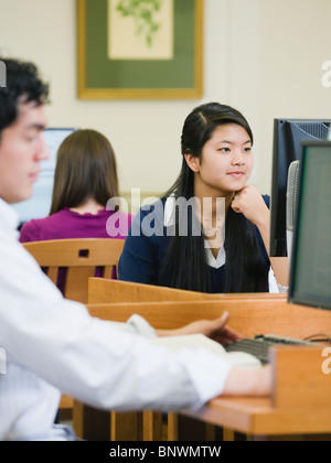 College students working in library Stock Photo