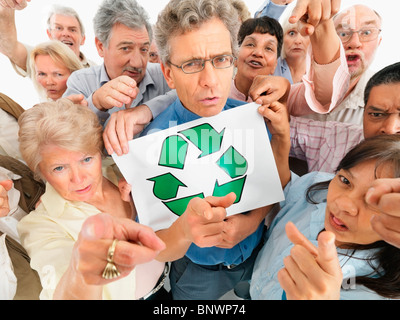 A group of people pointing their fingers Stock Photo