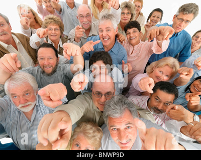 A group of people pointing up Stock Photo