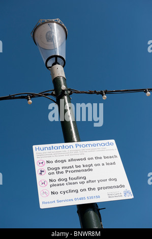 Sign listing rules and regulations on a lamp post at Hunstanton Promenade, Norfolk, England. Stock Photo