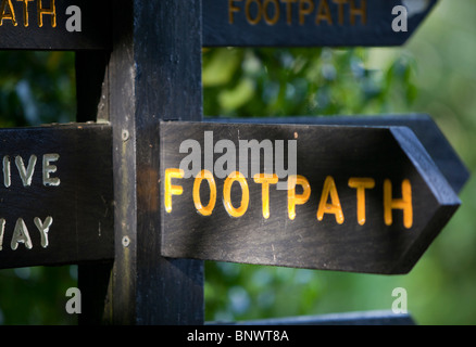 Wooden public footpath sign in the English Countryside Stock Photo