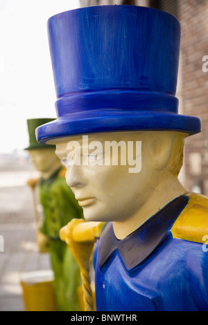 Figures dressed as Hans Hummel, the iconic water carrier and legendary character closely associated with Hamburg, Germany. Stock Photo