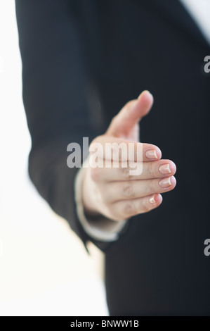Hand extended for handshake Stock Photo