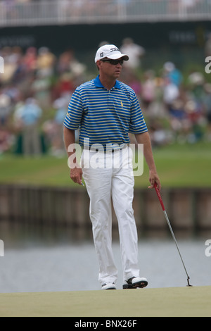 Davis Love III on the 17th green during a practice round of the 2009 Players Championship. Stock Photo