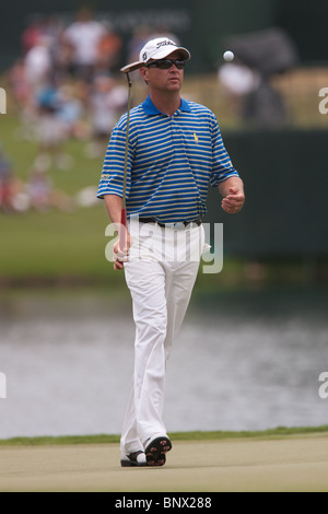 Davis Love III on the 17th green during a practice round of the 2009 Players Championship. Stock Photo