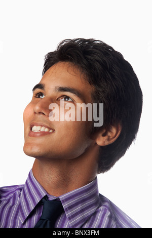 portrait of a young asian american man looking up Stock Photo