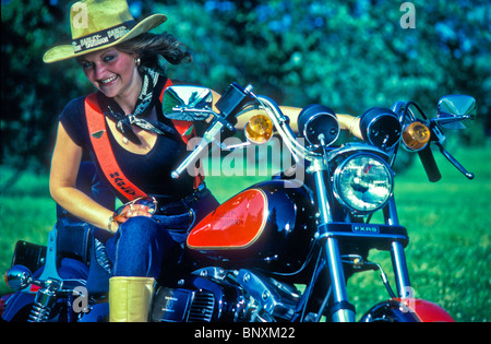 Motorcyclist biker chick straw hat 