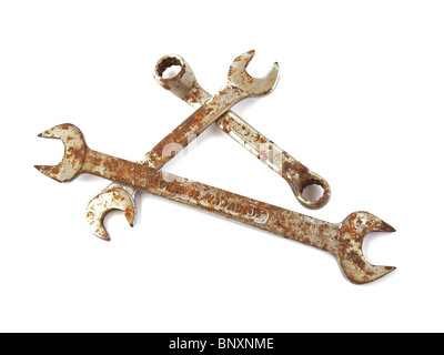 Rusty spanner on a plane white background. Stock Photo