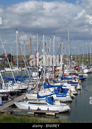 Boats and yachts moored at Tollesbury Marina in Tollesbury on the Dengie Penninsula, Essex, UK. Stock Photo