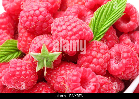 Crockery with raspberries. Macro shot. Stock Photo