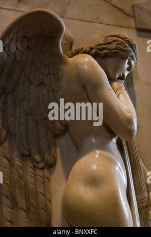 Sorrowful angel flanking the Monument to the Stuarts, St. Peter's Basilica, Rome, Italy Stock Photo