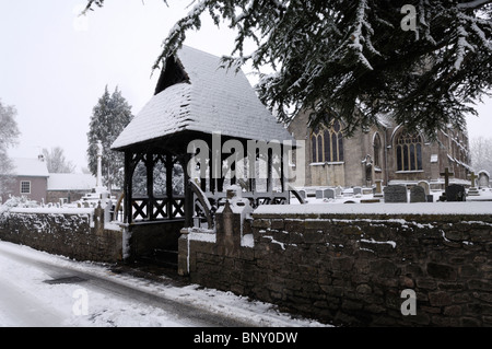 The lychgate at Wrington All Saints Church in the snow. Wrington Somerset, England. Stock Photo