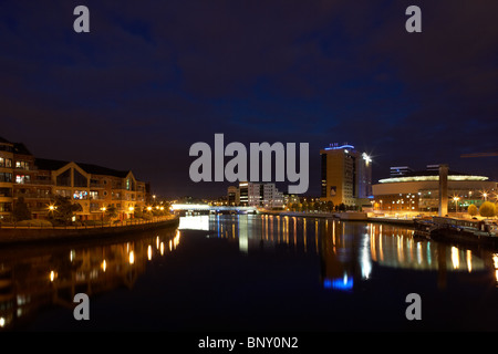 river lagan and city skyline at night Belfast Northern Ireland UK Stock Photo