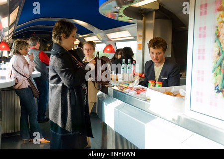 On Board, TGV Bullet Train, Lyon France, Passengers Buying Lunch  inside Restaurant Car, people on high speed train transportation, inside bar france Stock Photo