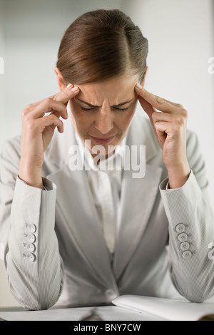Woman having a bad headache Stock Photo