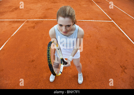 Teenage girl playing tennis Stock Photo