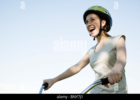Teen girl riding bicycle Stock Photo