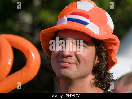 A Dutch football fan at the Museumplein in Amsterdam watching a live screening of the 2010 World Cup final Stock Photo