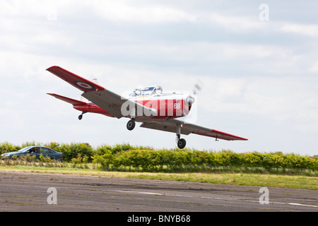 De Havilland (Canada) DHC-1 Chipmunk 22 T10 WD390 68 G-BWNK  in flight and about to land at Wickenby Airfield Stock Photo