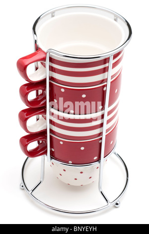 Red and white striped and spotted 4 cup metal framed mug stack Stock Photo