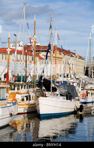 Wooden boats in Victoria harbour during annual Classic 