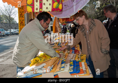 Arles, France, Woman Shopping, Locally Made Fabrics, in Farmer's Market Outside Sidewalk, people on holiday Stock Photo