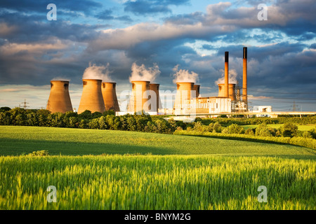 Coal powered Ferrybridge Power Station cooling towers at sunset near Castleford West Yorkshire UK Stock Photo