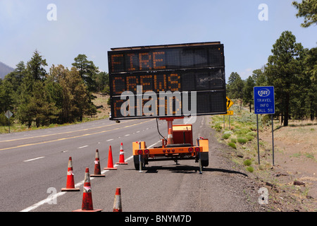 Flagstaff Arizona, Schultz mountain wildfires June 2010 - highway warning sign, fire crews ahead Stock Photo