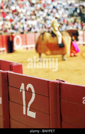 Number 12 on the barrier of the bullring, Seville, Spain Stock Photo