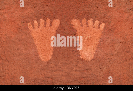 Ancient American Indian Petroglyph in Valley of Fire's red sandstone, Nevada USA. Stock Photo