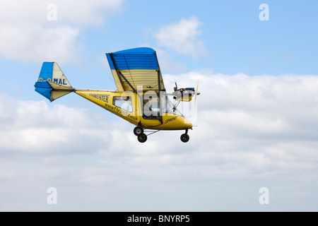 Thruster T600N 450 Sprint G-OMAL microlight aircraft on final approach to land at Wickenby Airfield Stock Photo