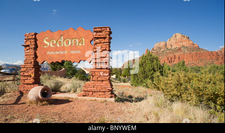 Sedona, Arizona - Sedona City limits sign entering from south on 179 welcome, founded 1902, with red rock vista. Stock Photo
