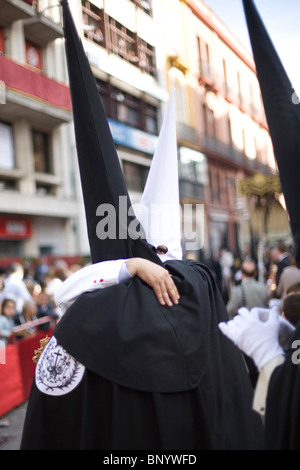 Believers in a procession on Palm Sunday, Seville, Spain Stock Photo