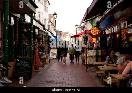 Shoppers meander through shops in the North Laines area in Brighton Stock Photo