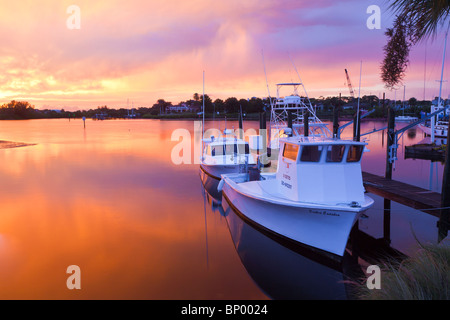 Tarpon Springs, FL - Jul 2010 - Private and commercial fishing boat at sunset at Tarpon Springs, Florida Stock Photo