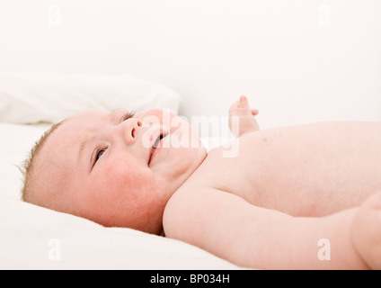 Shot of a Four Month Old Baby Lying Down Stock Photo