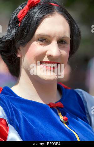 Attendee poses as Snow White or Little Miss Muffet at Gay Pride March, London, England, UK, Europe Stock Photo