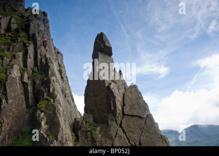 Climbers on Napes Needle as viewed from the Dress Circle, Great Gable, Lake District, Cumbria Stock Photo