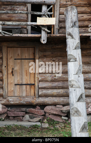 Traditional wood house at Finland's biggest Viking Market Festival and re-enactment camp at Kvarnbo on land archipelago Stock Photo