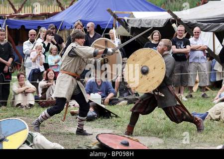 Battle reenactment Finland's biggest Viking Market Festival at Kvarnbo on land archipelago Stock Photo