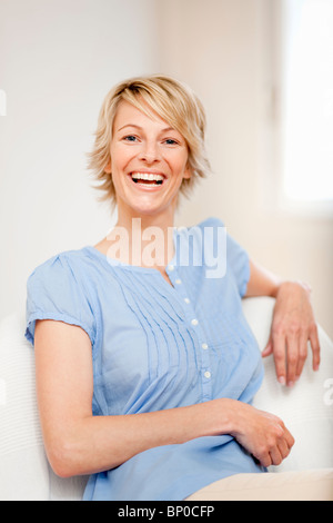 Young woman at home Stock Photo