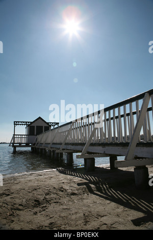 Wooden pier on Mar Menor with midday sun, San Pedro del Pinatar, Murcia, South Spain Stock Photo